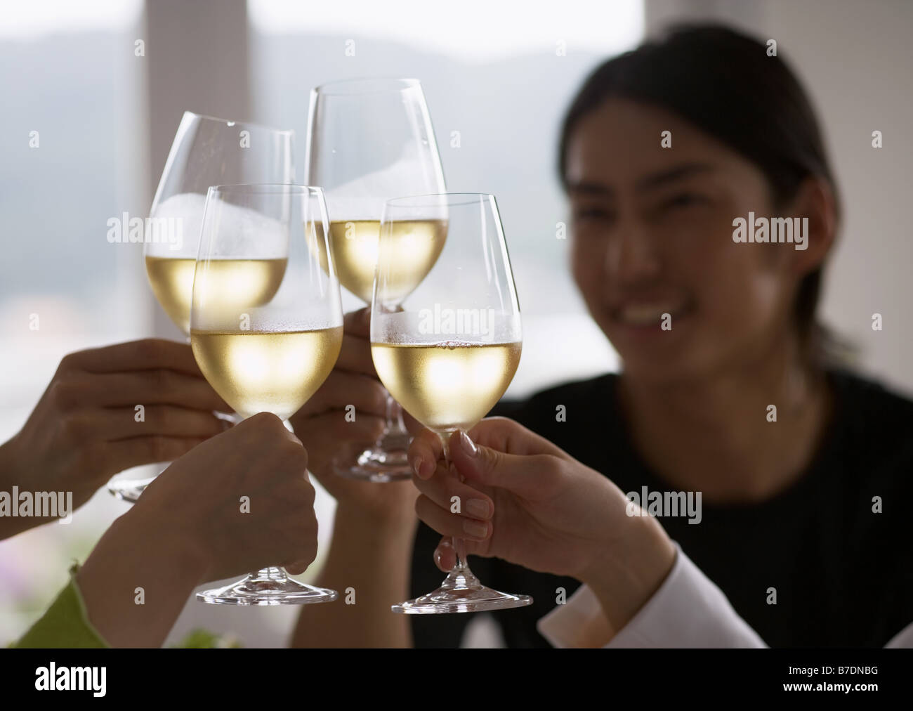 Man toasting with white wine Stock Photo Alamy