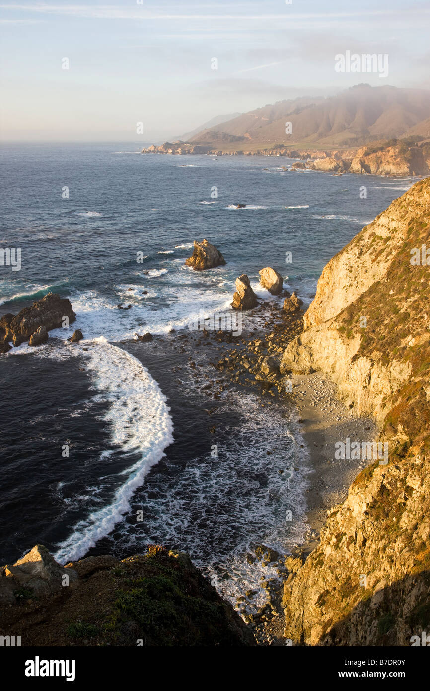 Pacific Ocean and coast viewed at sunset from north of the Bixby Bridge, Highway 1, Big Sur, California, USA Stock Photo