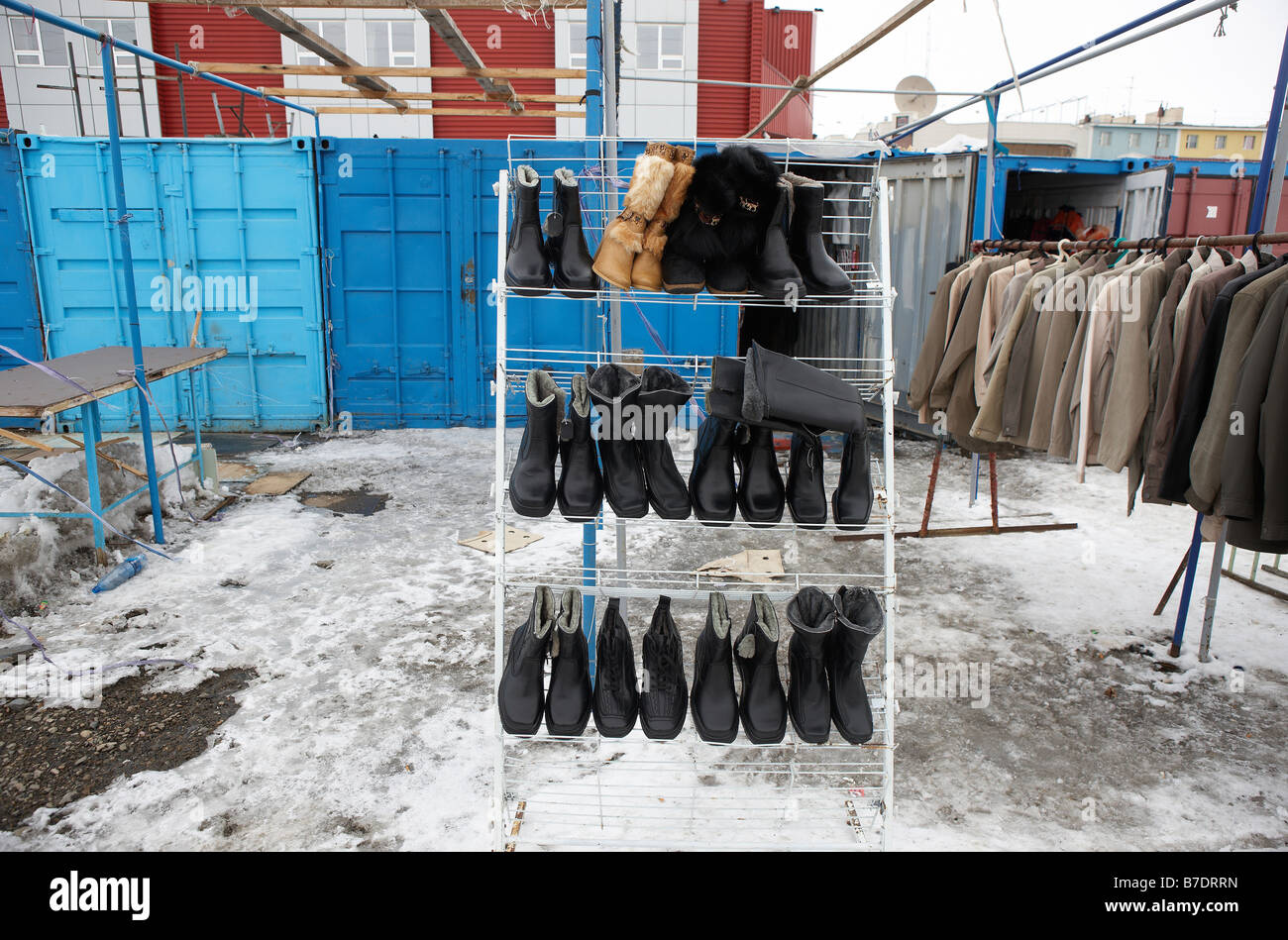 Shoes and Clothing being sold in outdoor market, Anadyr Chukotka,  Siberia Russia Stock Photo