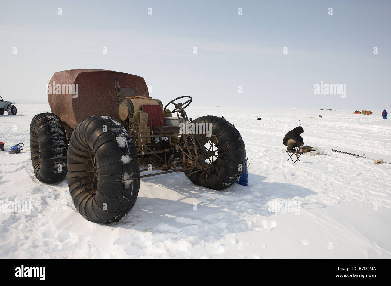 Ice fishing by homemade 4 wheeler motorbike,  Anadyr Chukotka, Siberia Russia Stock Photo