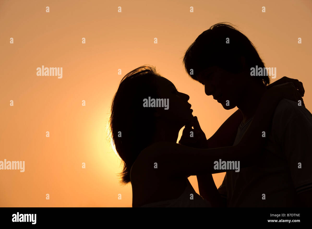 Silhouette couple embracing other hi-res stock photography and images ...