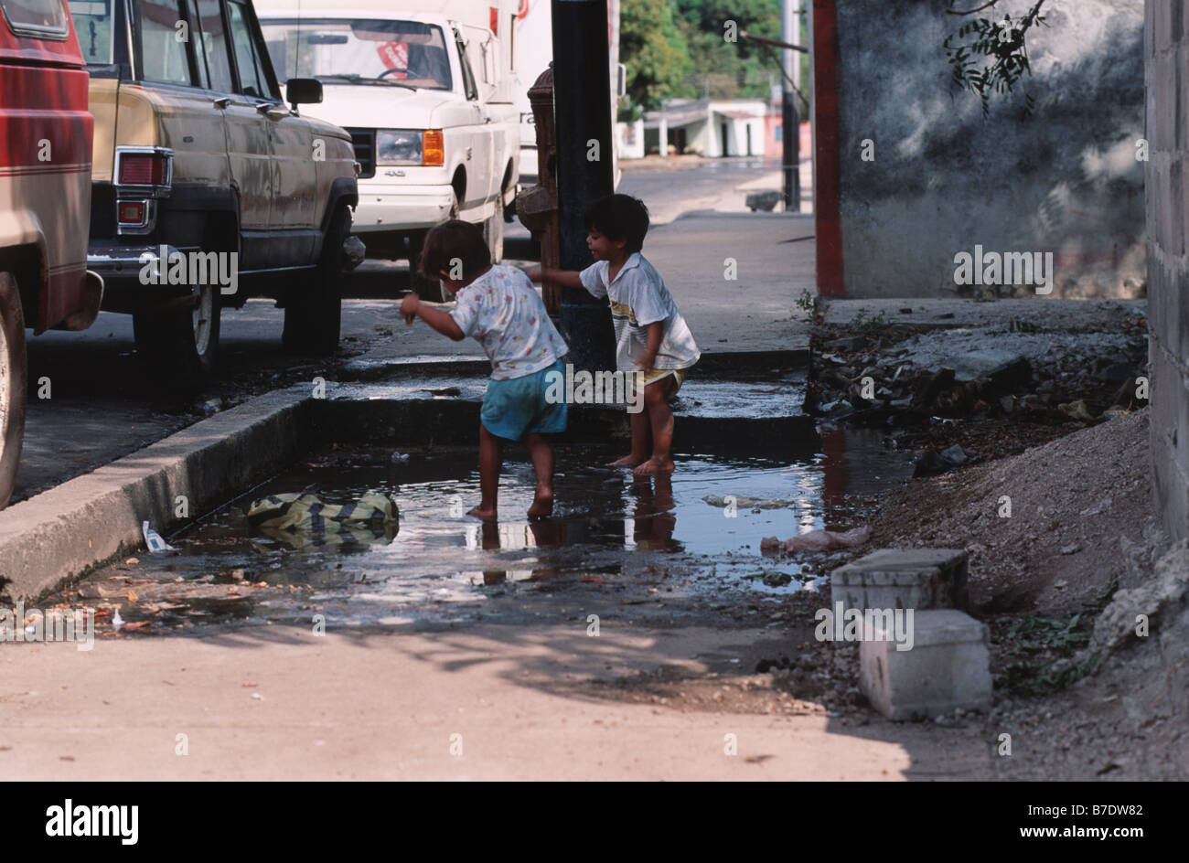 playing children on the street, Venezuela, Puerto Ayacucho Stock Photo