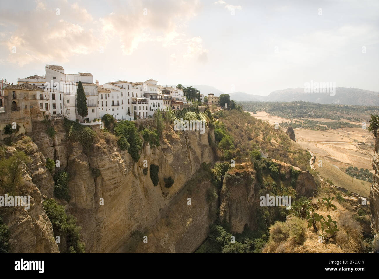 houses overlooking the gorge at ronda  from la puente nueva spain andalucia europe Stock Photo
