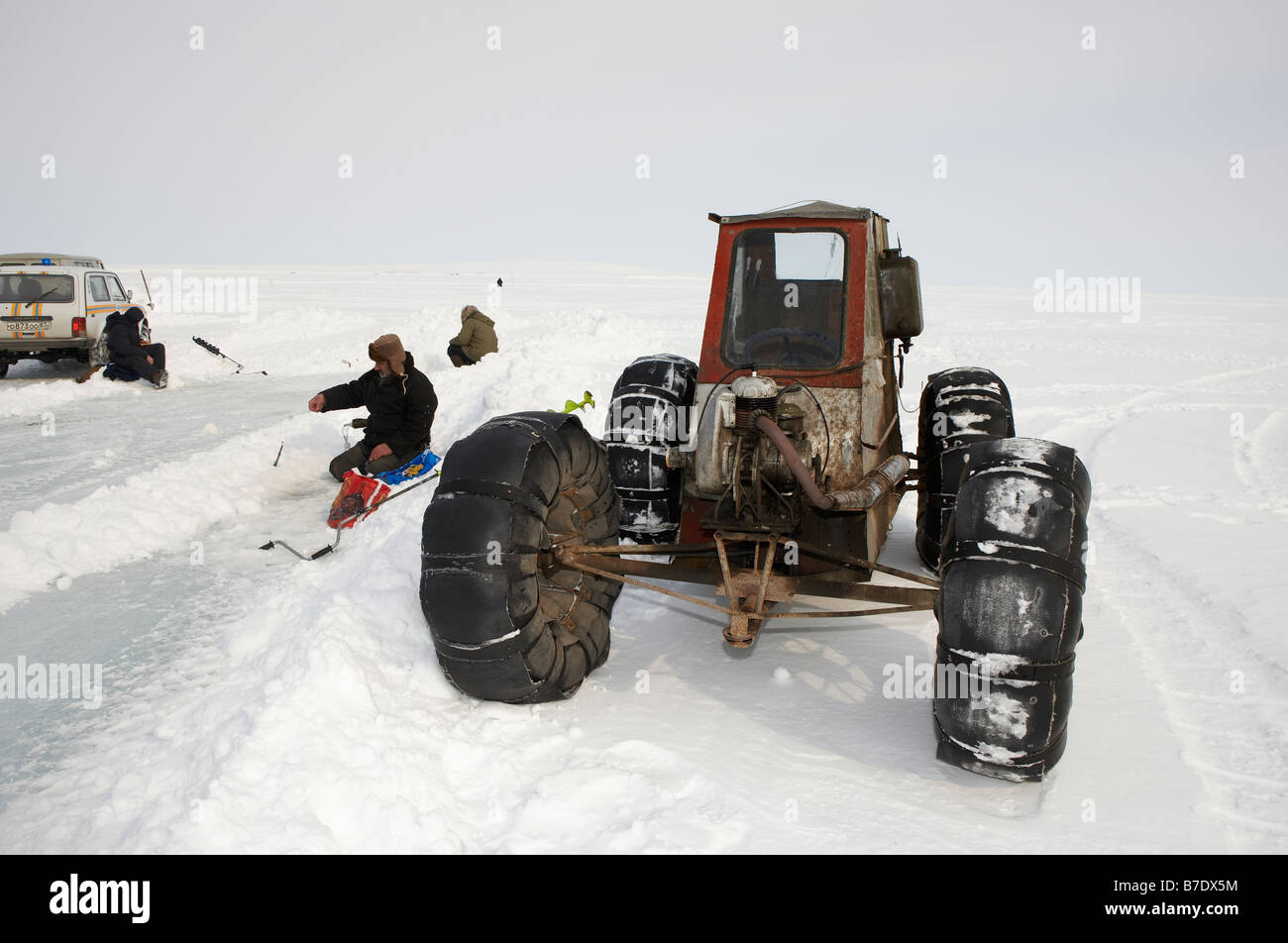 Ice fishing for smelts by homemade 4 wheeler vehicle, Anadyr Chukotka,  Siberia Russia Stock Photo - Alamy