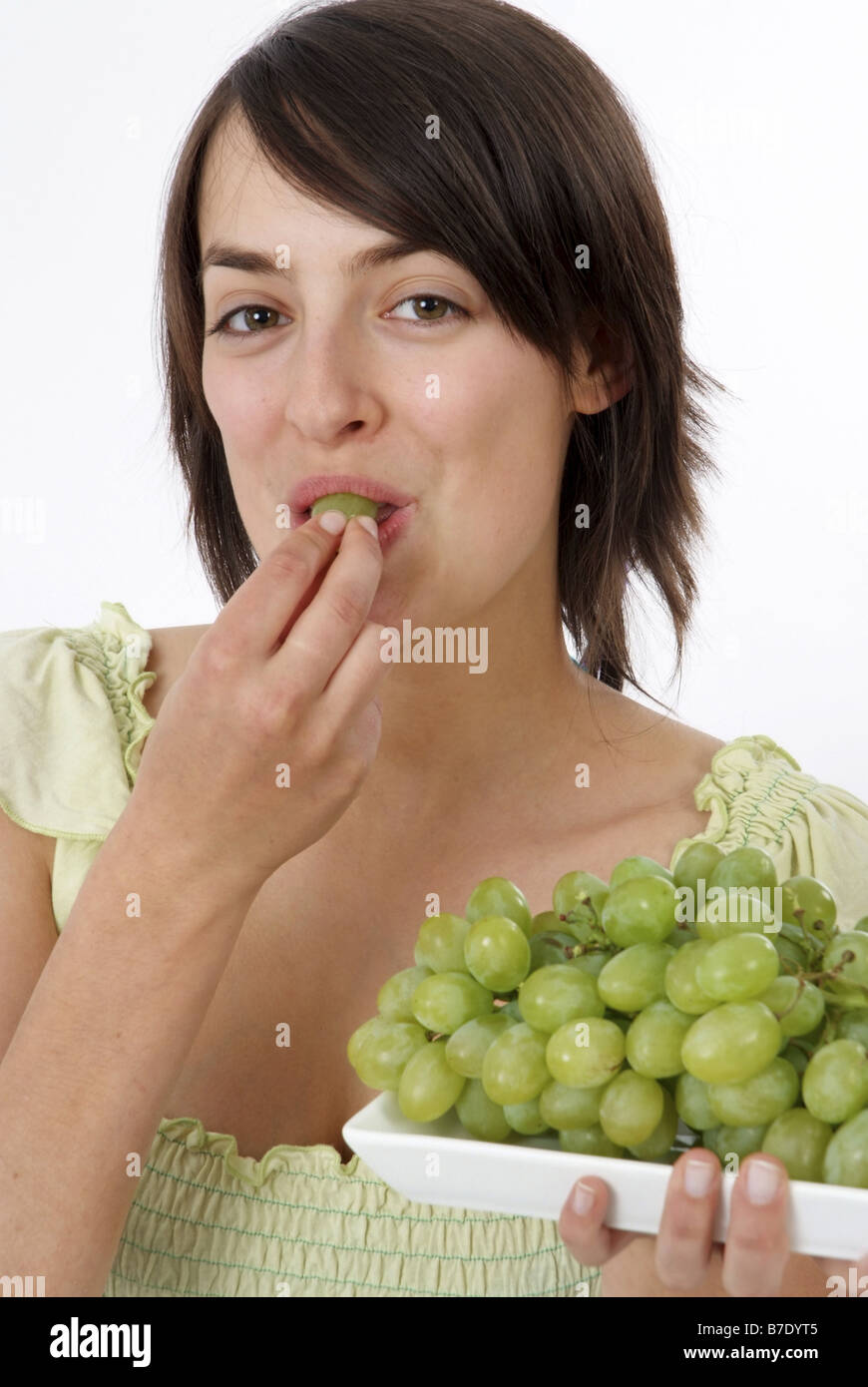 young woman with grapes Stock Photo