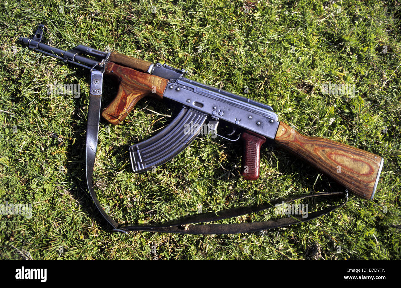 Kalashnikov or AK 47 lying on a meadow Stock Photo - Alamy