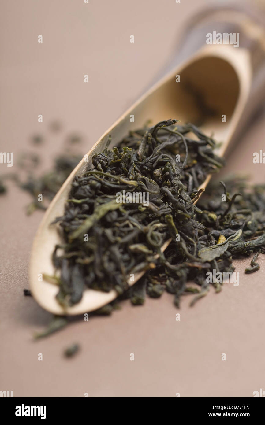 Green Tea Leaves with Small Bamboo Scoop Stock Photo Alamy