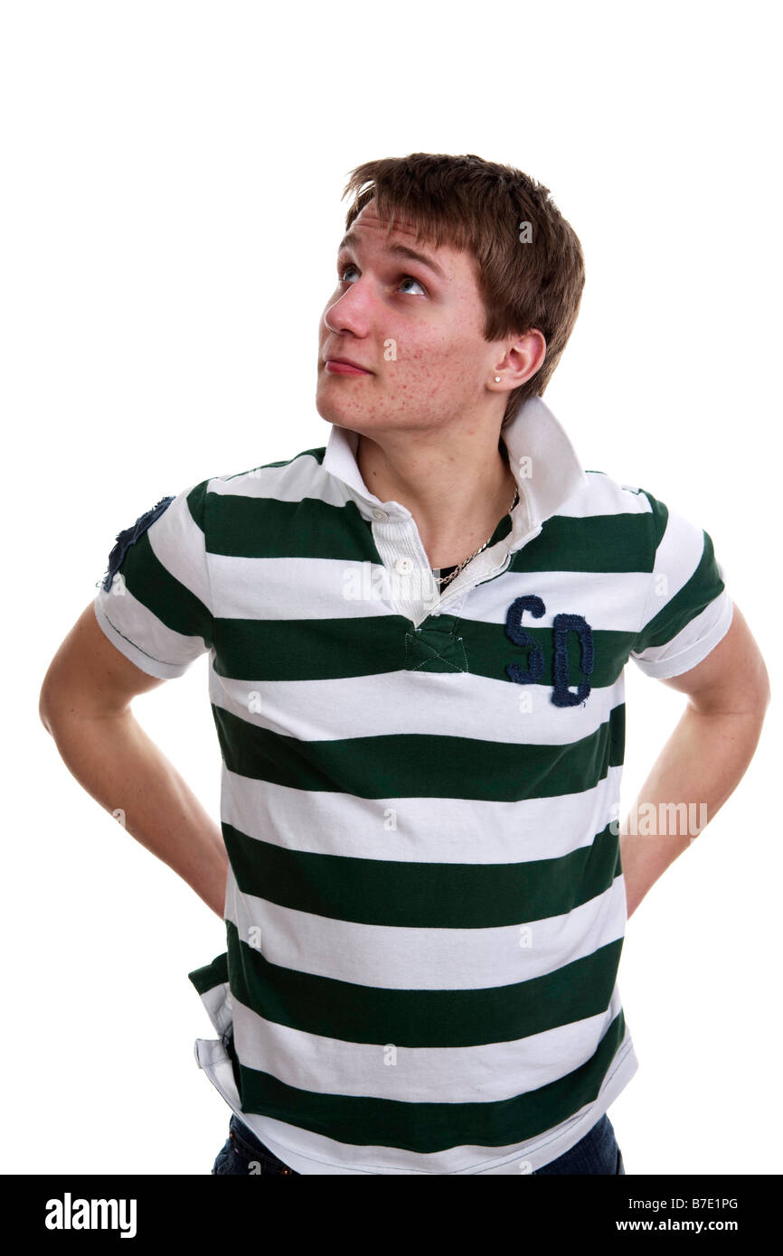 Teenage Lad Looking Upwards With Half Smile and Raised Eyebrows In