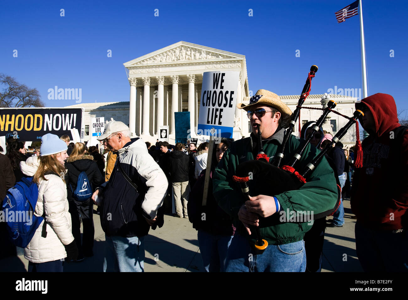 A Pro-Life supporter plays the bagpipes in front of the US Supreme Court - March for Life Rally, 2009 - Washington, DC USA Stock Photo