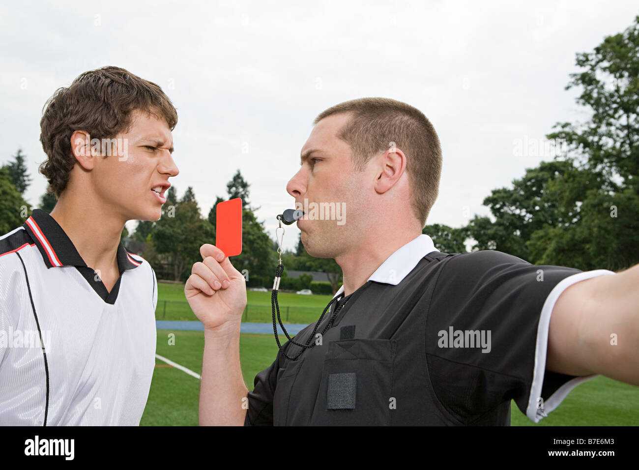 Referee giving red card Stock Photo Alamy
