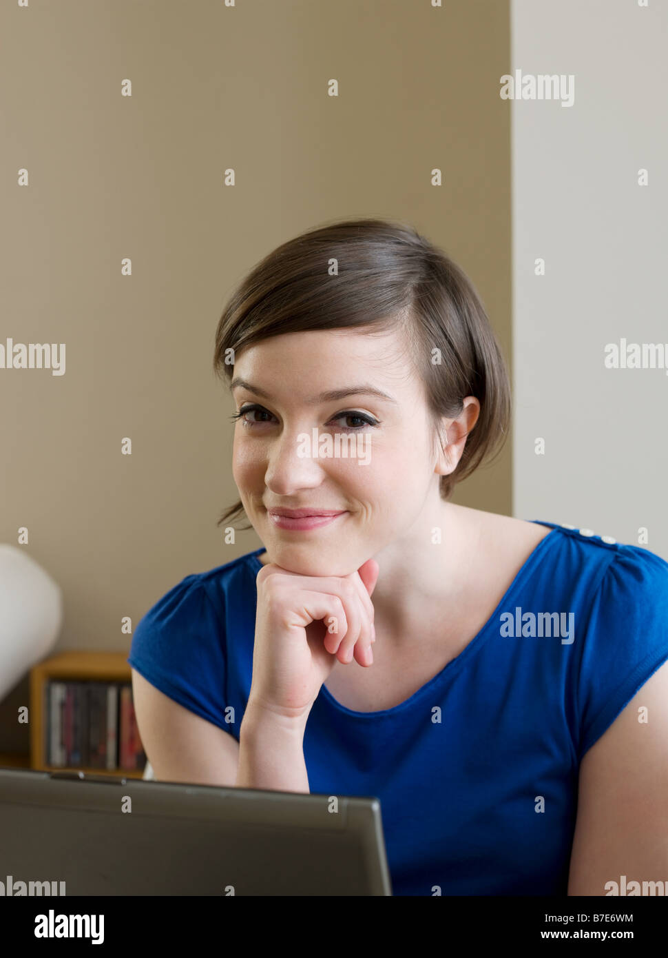 Portrait of a young woman and a laptop Stock Photo - Alamy