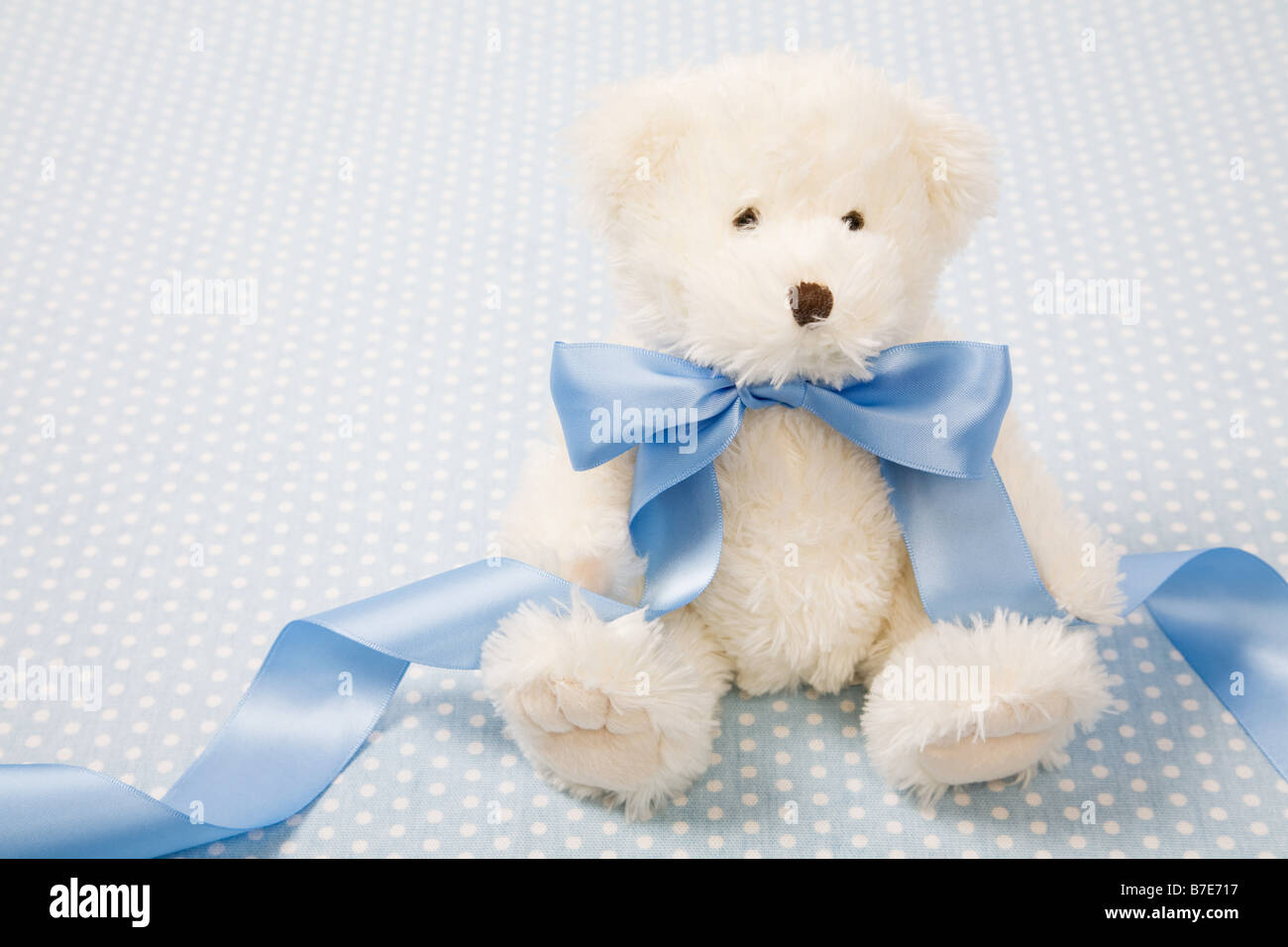 Teddy bear with a bow Stock Photo - Alamy