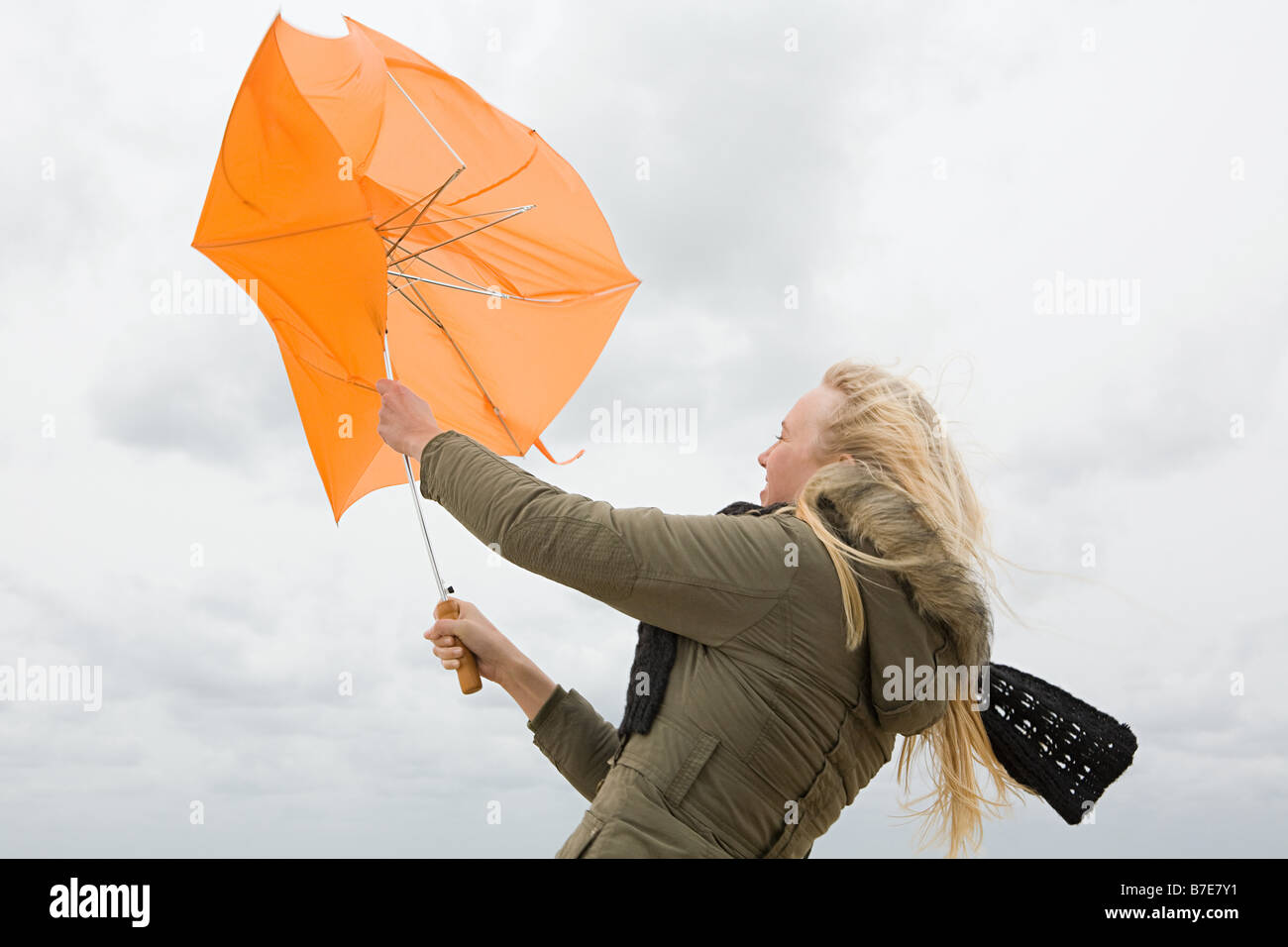 Struggling with wind hi-res stock photography and images - Alamy