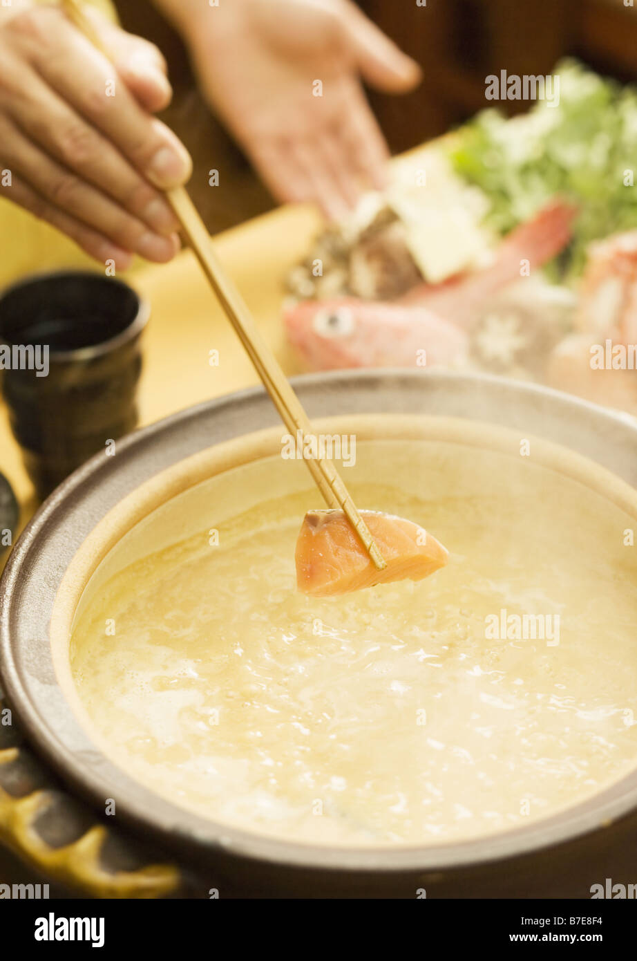 Woman Preparing Japanese Style Chowder Stock Photo Alamy