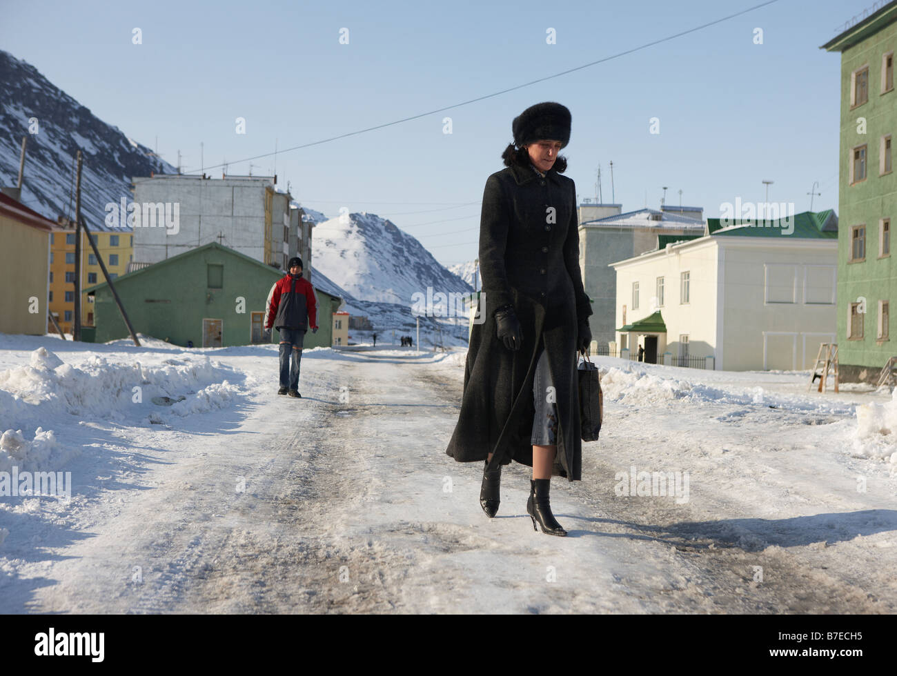 Russian woman walking in Egvekinot, Chukotka Siberia Russia Stock Photo