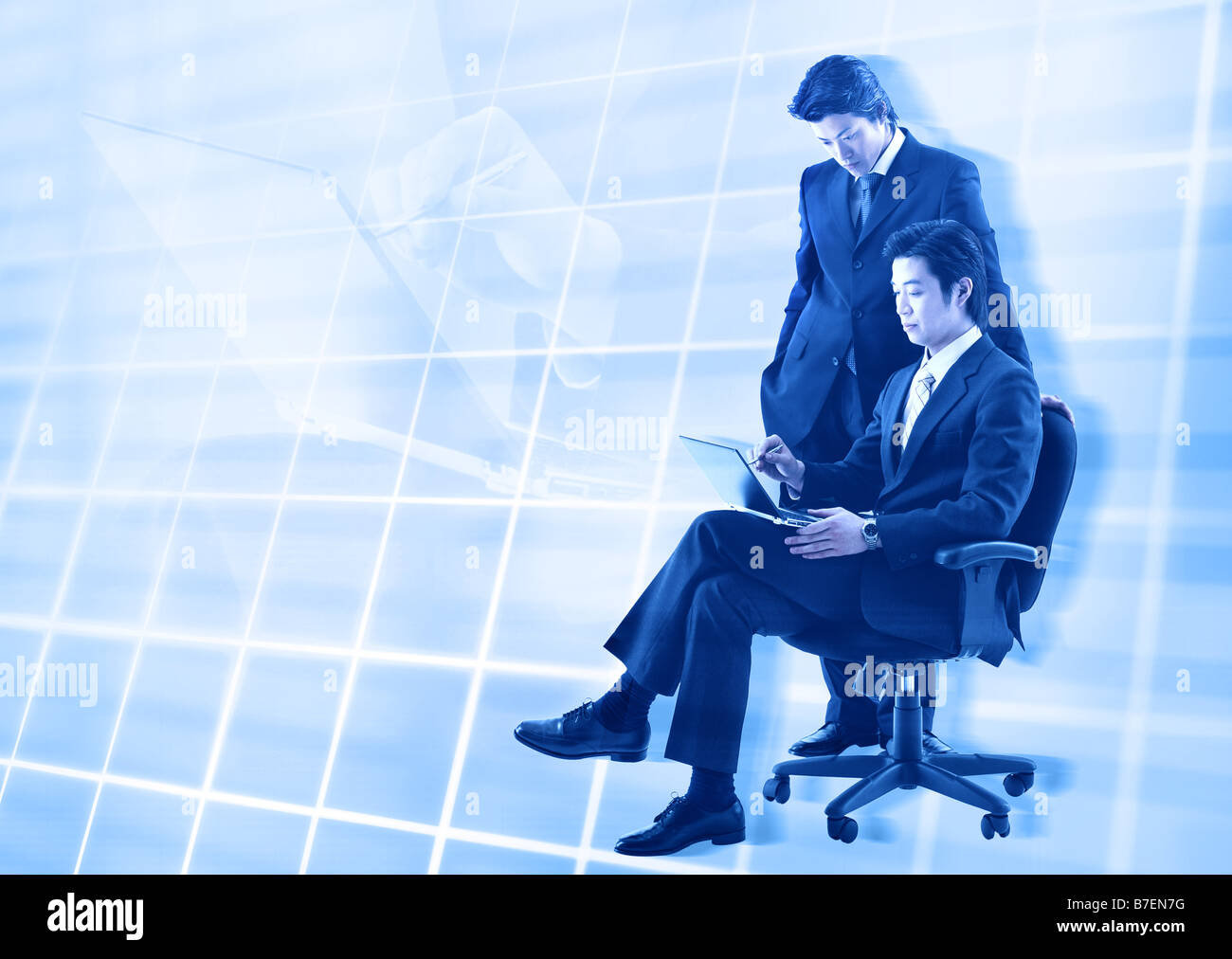 Global businessman sitting on chair Stock Photo - Alamy