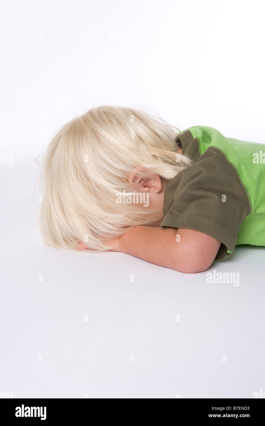 Child lying on floor crying hires stock photography and images Alamy