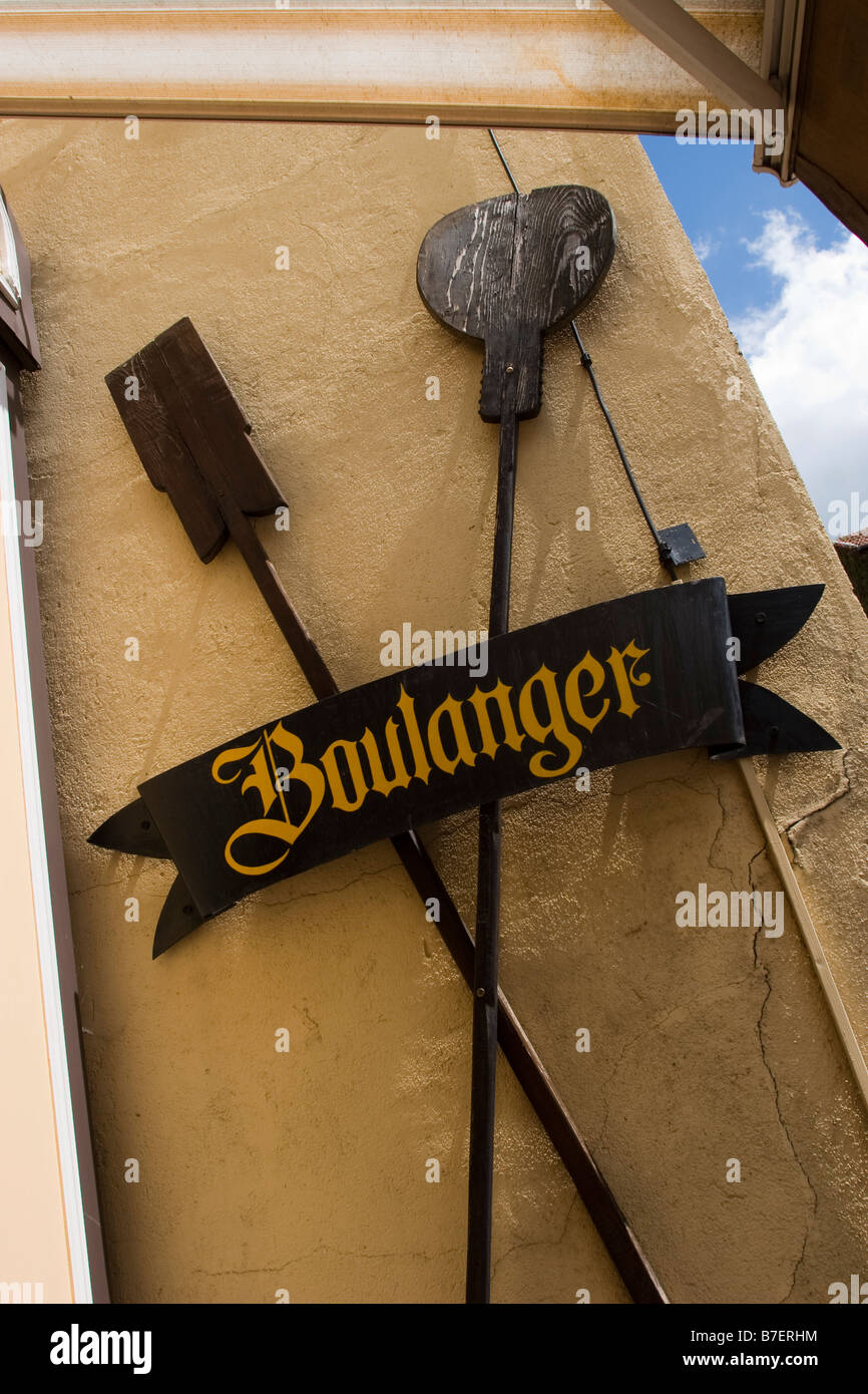 Boulanger paddles outside shop Nolay France EU Stock Photo