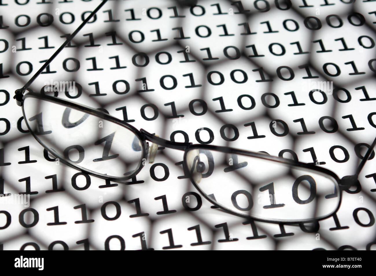 Glasses on binary background Stock Photo