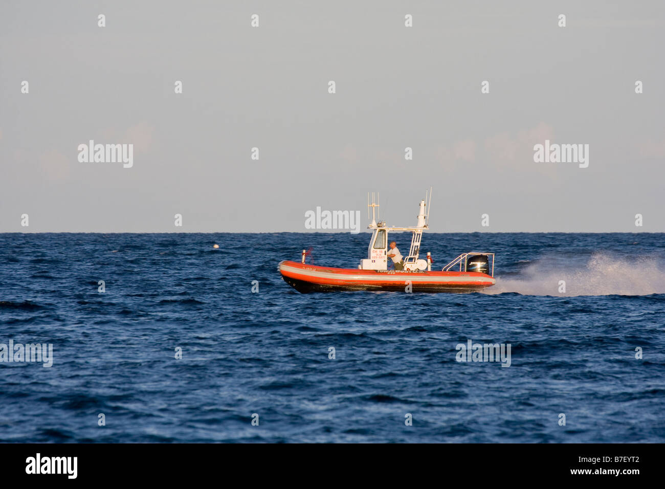 Small fast boat on ocean Stock Photo