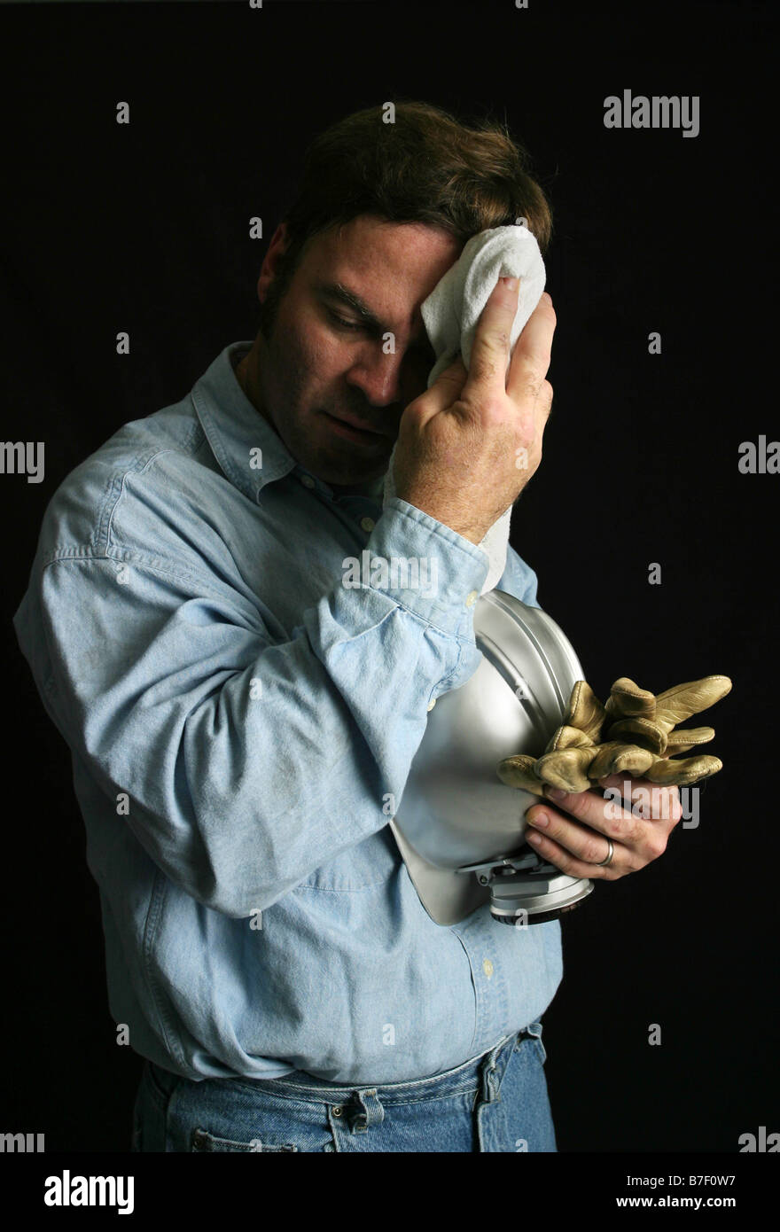 Wiping sweat off brow hires stock photography and images Alamy