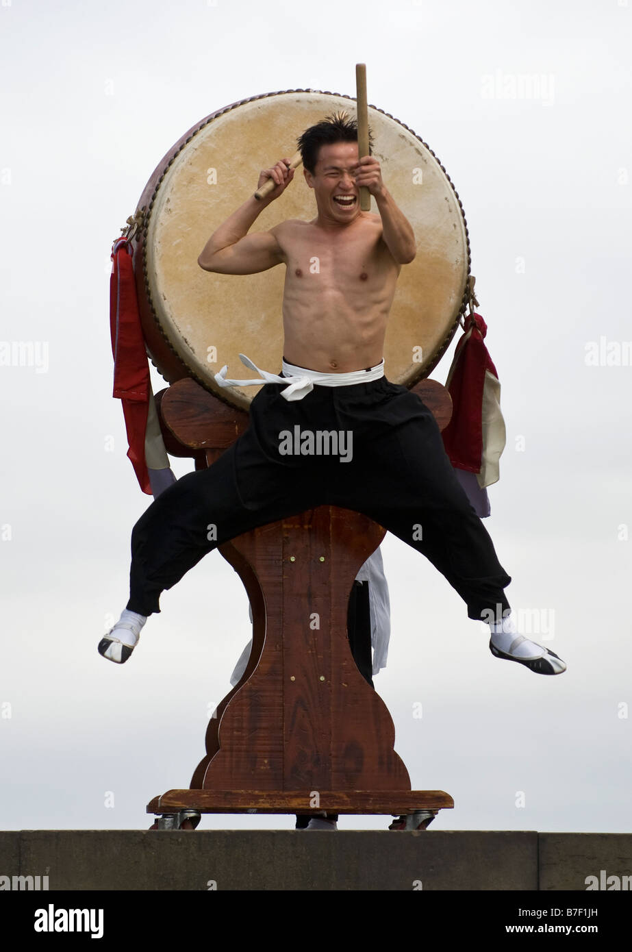 Street performance of Korean group presenting their martial arts show Jump in Edinburgh Stock Photo