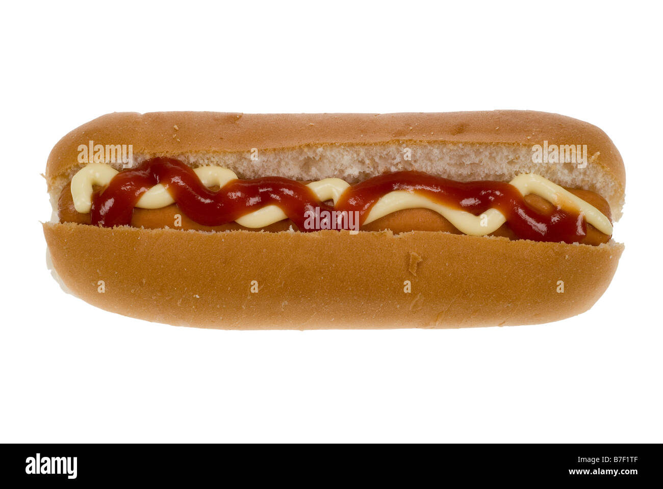 hot dog in a bun with mayonaise and ketchup isolated on a white