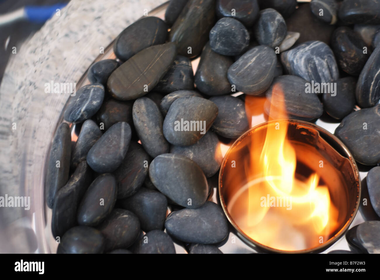 stones and flame, fire and pebble, horizontal Stock Photo