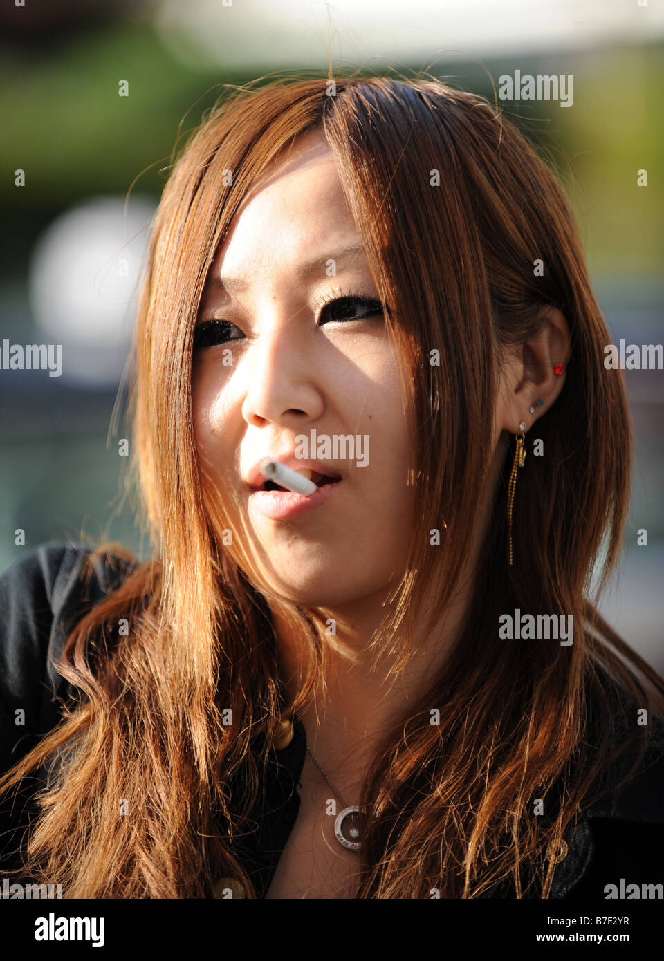 A Japanese girl smoking Stock Photo