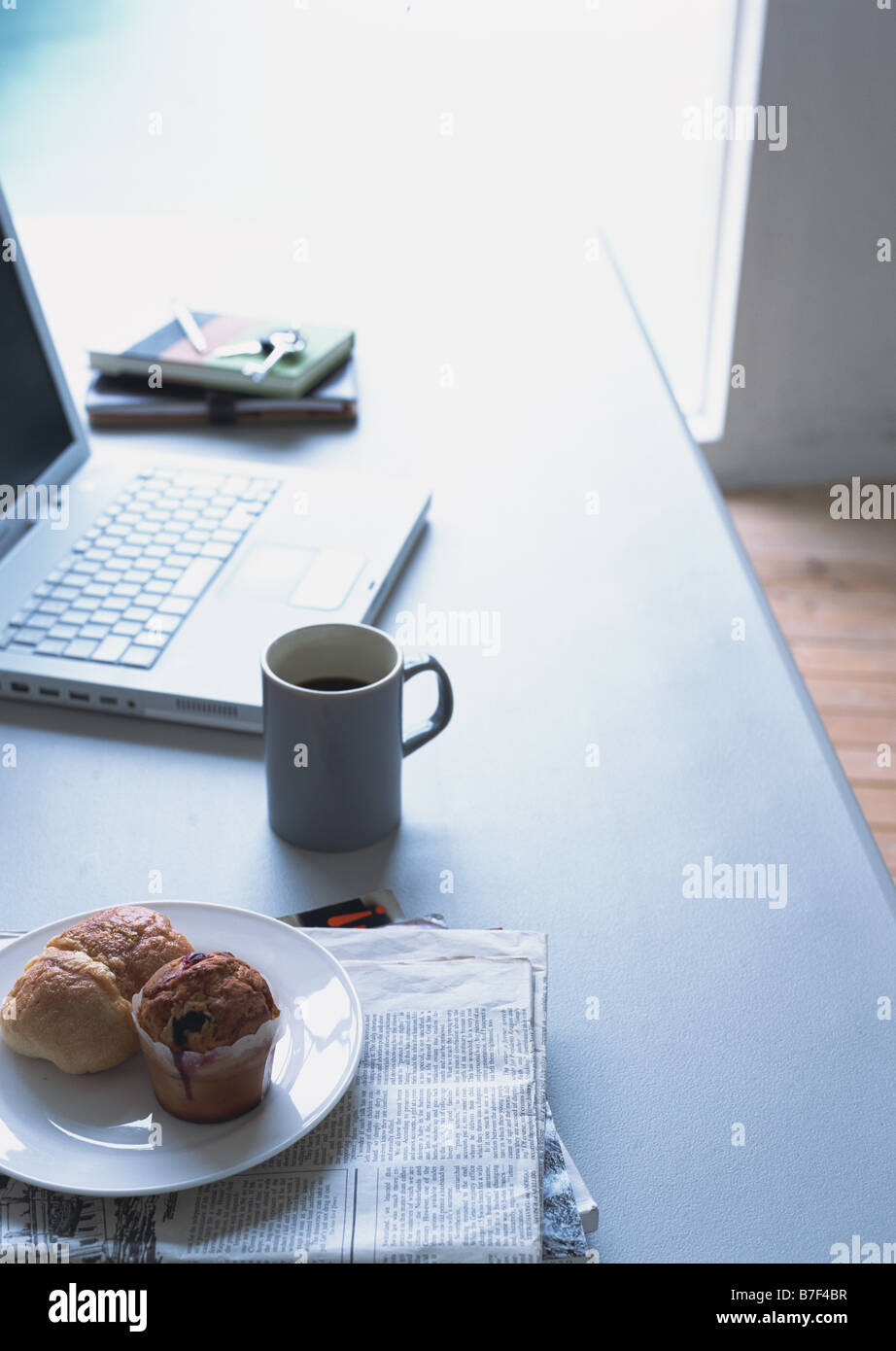 Breakfast on desk Stock Photo