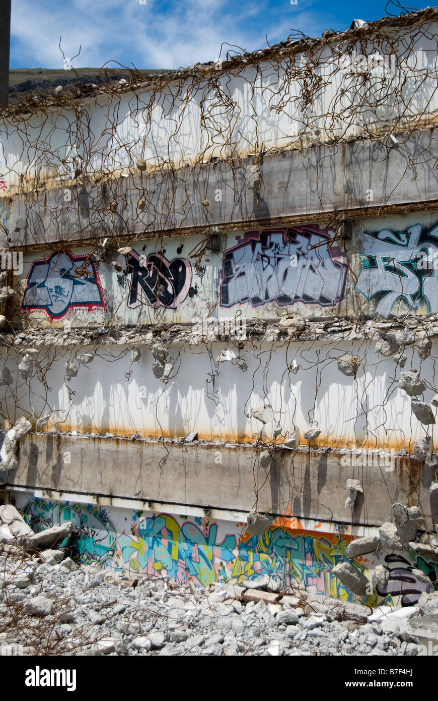 Exposed concrete wall during demolition, Heathcote Valley, Christchurch, Canterbury, New Zealand Stock Photo