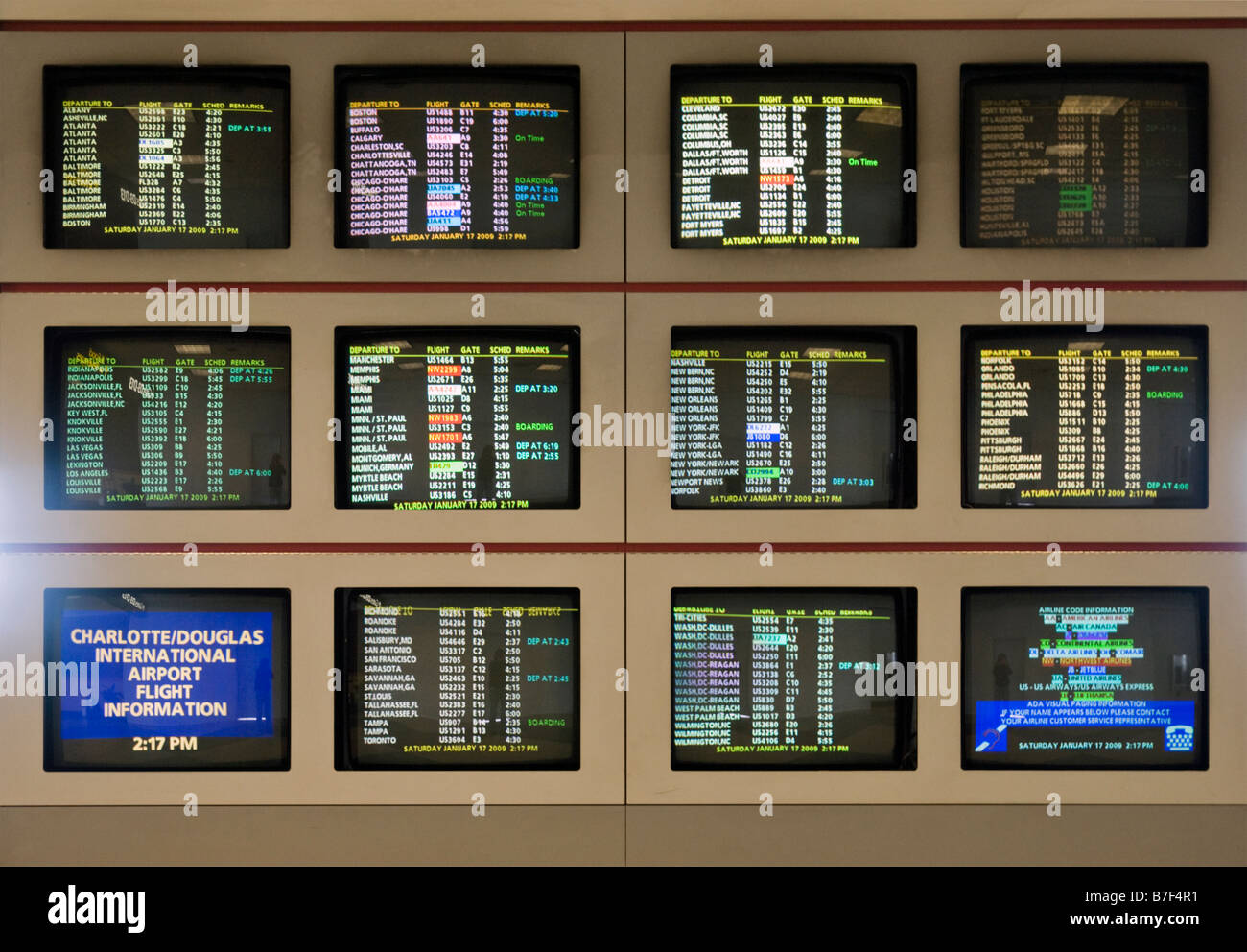 Airline Arrival and Departure Schedules on CRT Monitors Stock Photo