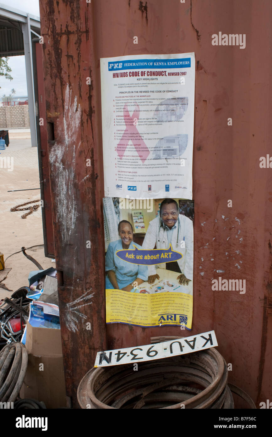 Aids health and safety poster in truck yard Mombasa Kenya Stock Photo