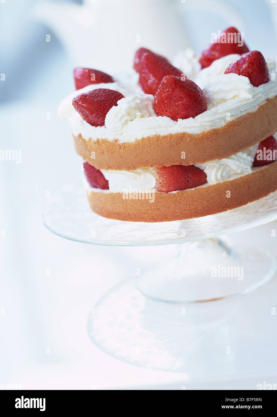 Strawberry shortcake on stand Stock Photo - Alamy