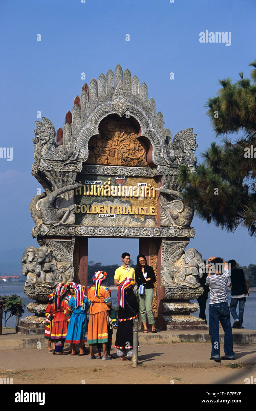 Golden Triangle Monument, Thai Tourists, Lisu Girls & Mekong River, at Junction of Burma, Laos & Thailand, Sop Ruak, Thailand Stock Photo