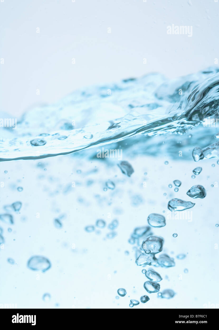 Wave Motion And Water Bubbles Stock Photo - Alamy