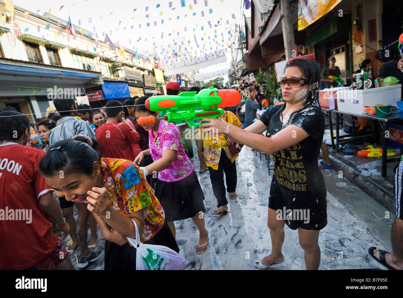 Young people celebrating the Thai new year of Songkran - Banglamphu Bangkok Thailand Stock Photo