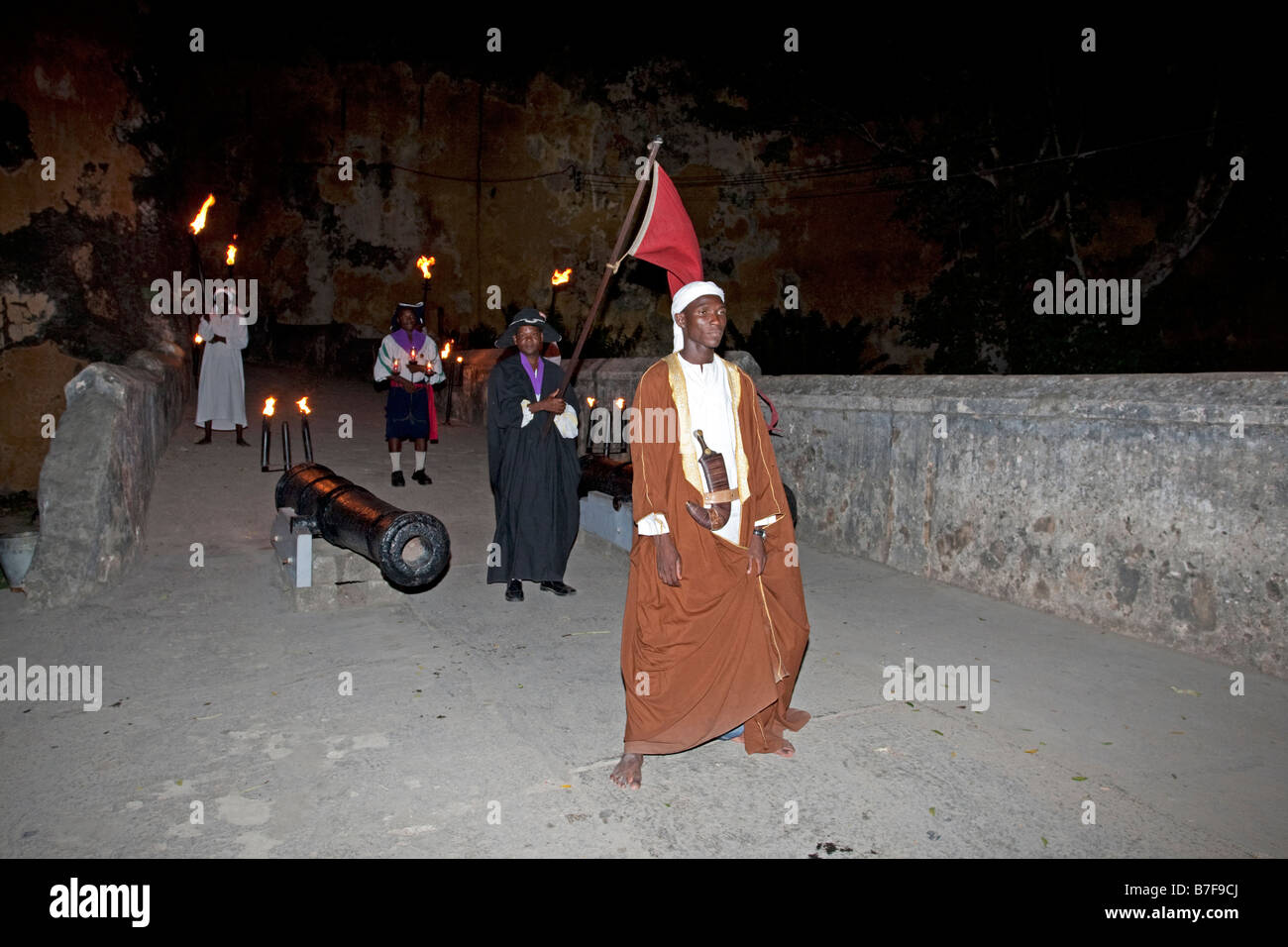 Swahili Arab in national dress at night Fort Jesus, Mombasa, Kenya