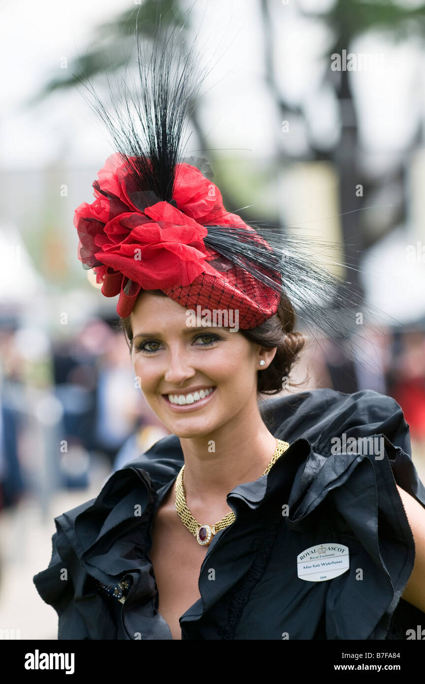 Elegant woman wearing a red hat at Royal Ascot 2008, England UK Stock Photo