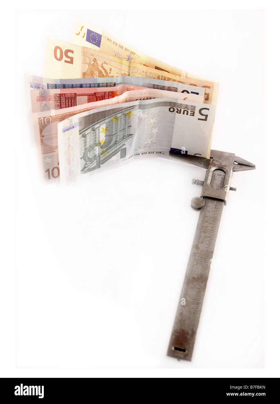 symbolic measurement of money value Stock Photo