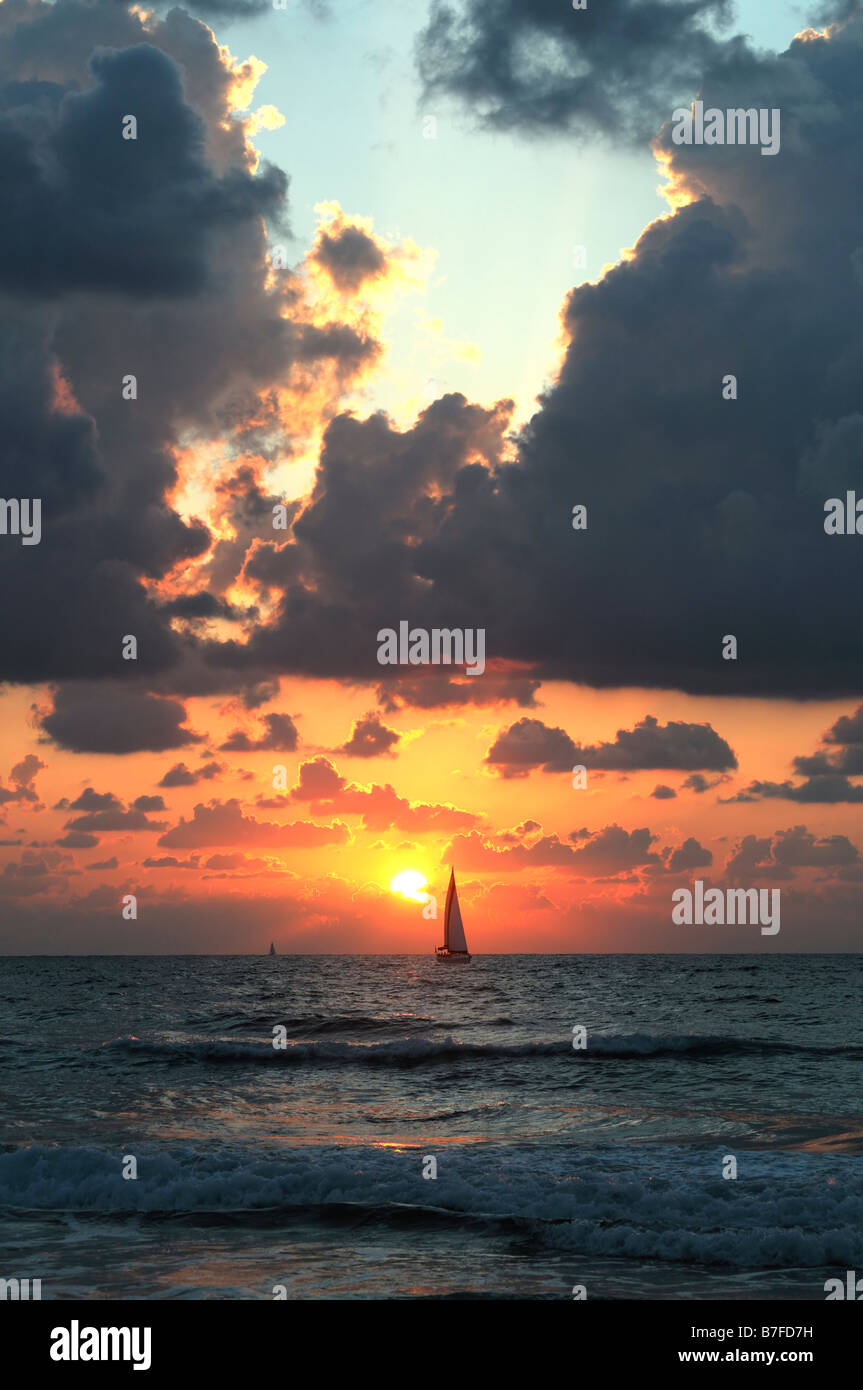 Sunset with sailing boat hi-res stock photography and images - Alamy
