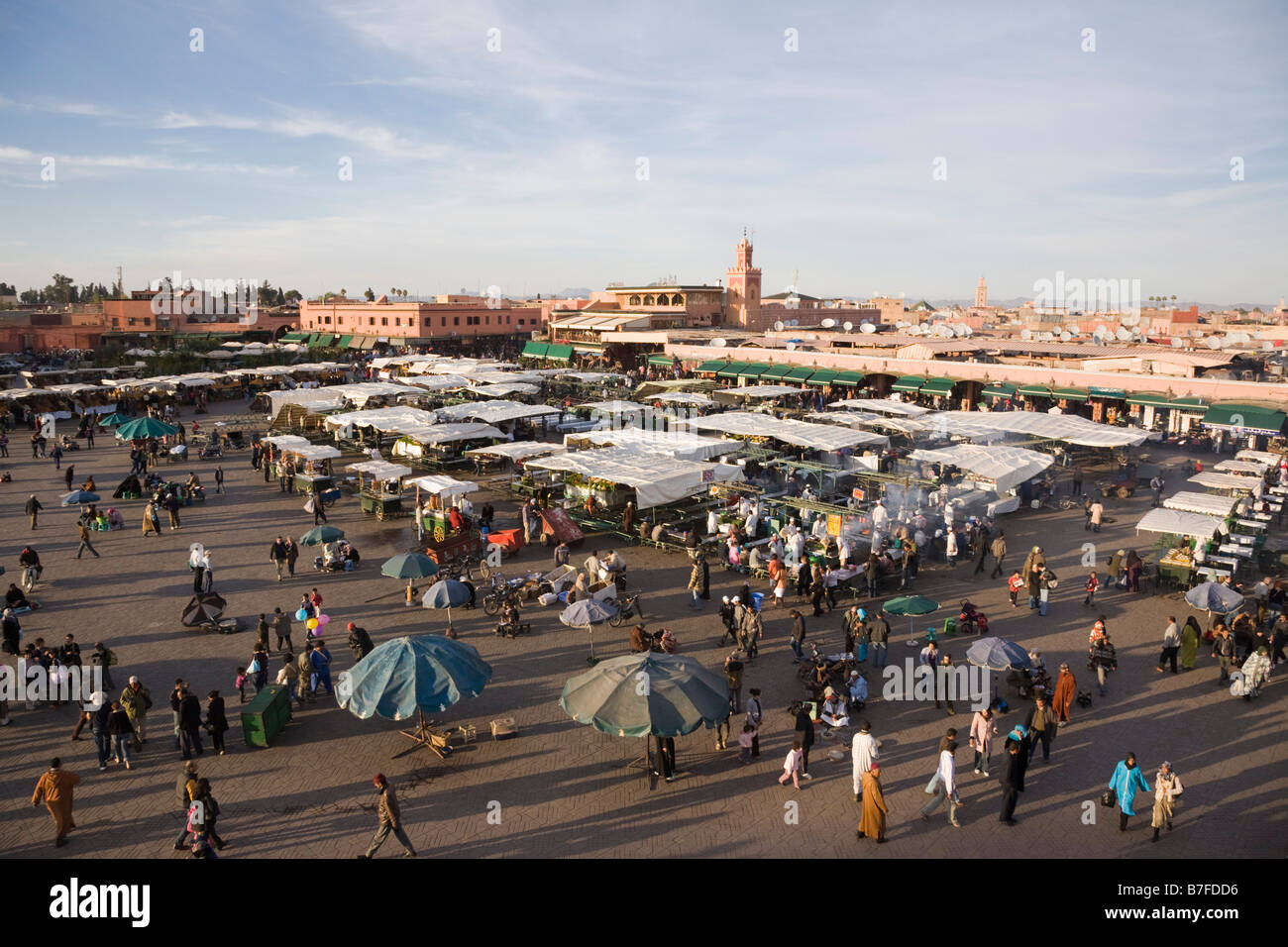 Marrakech Morocco North Africa High view of stalls and people in Place Djemma el Fna square in early evening in the Medina Stock Photo