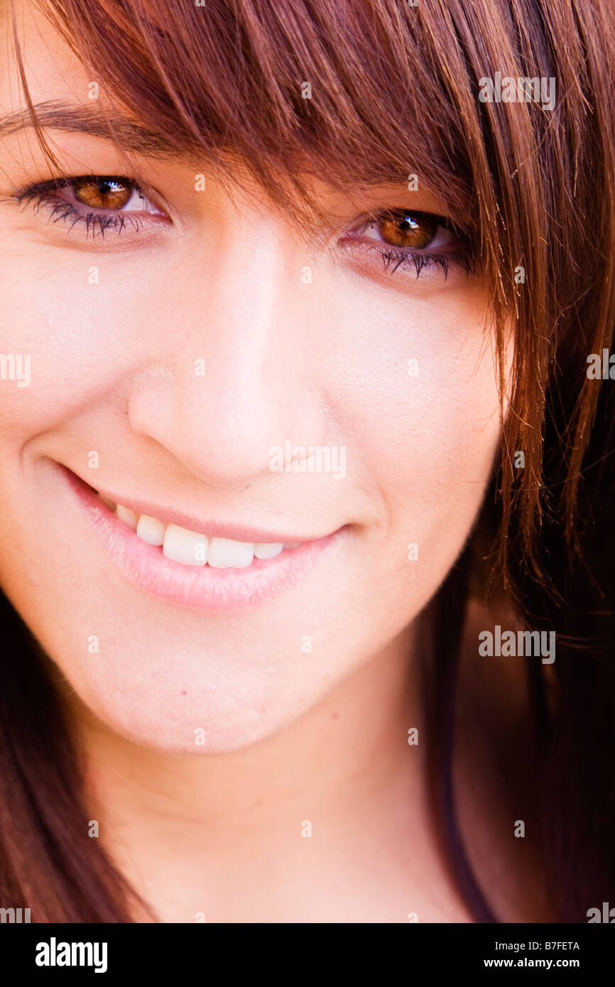 Young beautiful woman portrait staring at camera Stock Photo