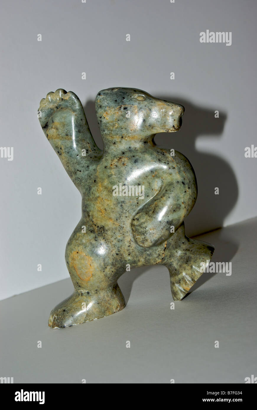 Inuit art dancing bear sculpture in carved soapstone Stock Photo Alamy
