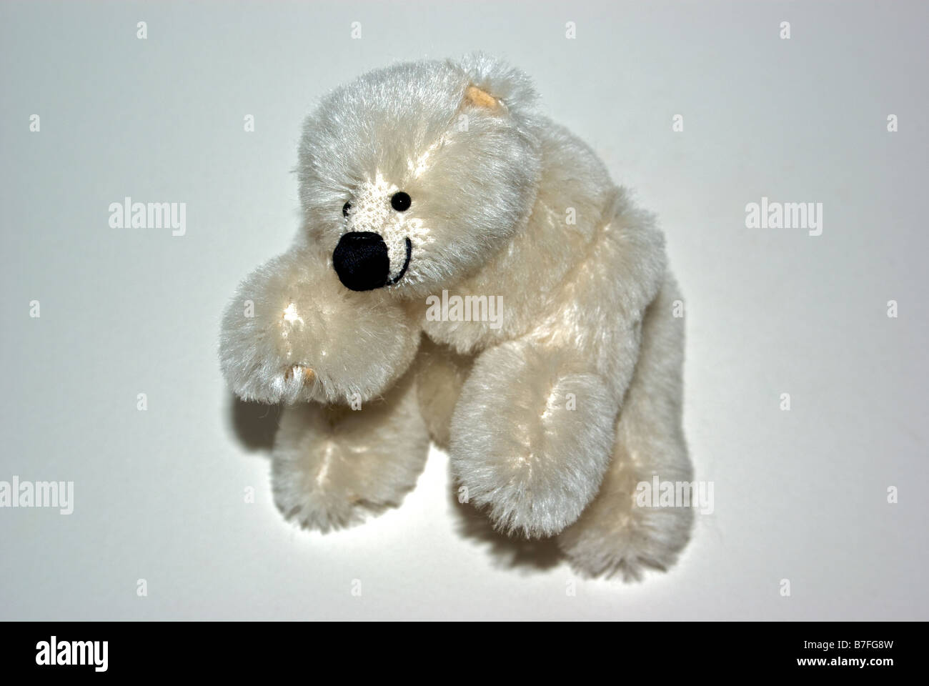 Hand made plush articulated stuffed toy polar bear Stock Photo