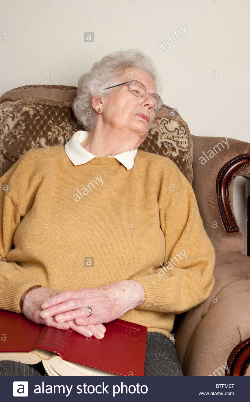 An old woman asleep in a chair Stock Photo 21857983 Alamy