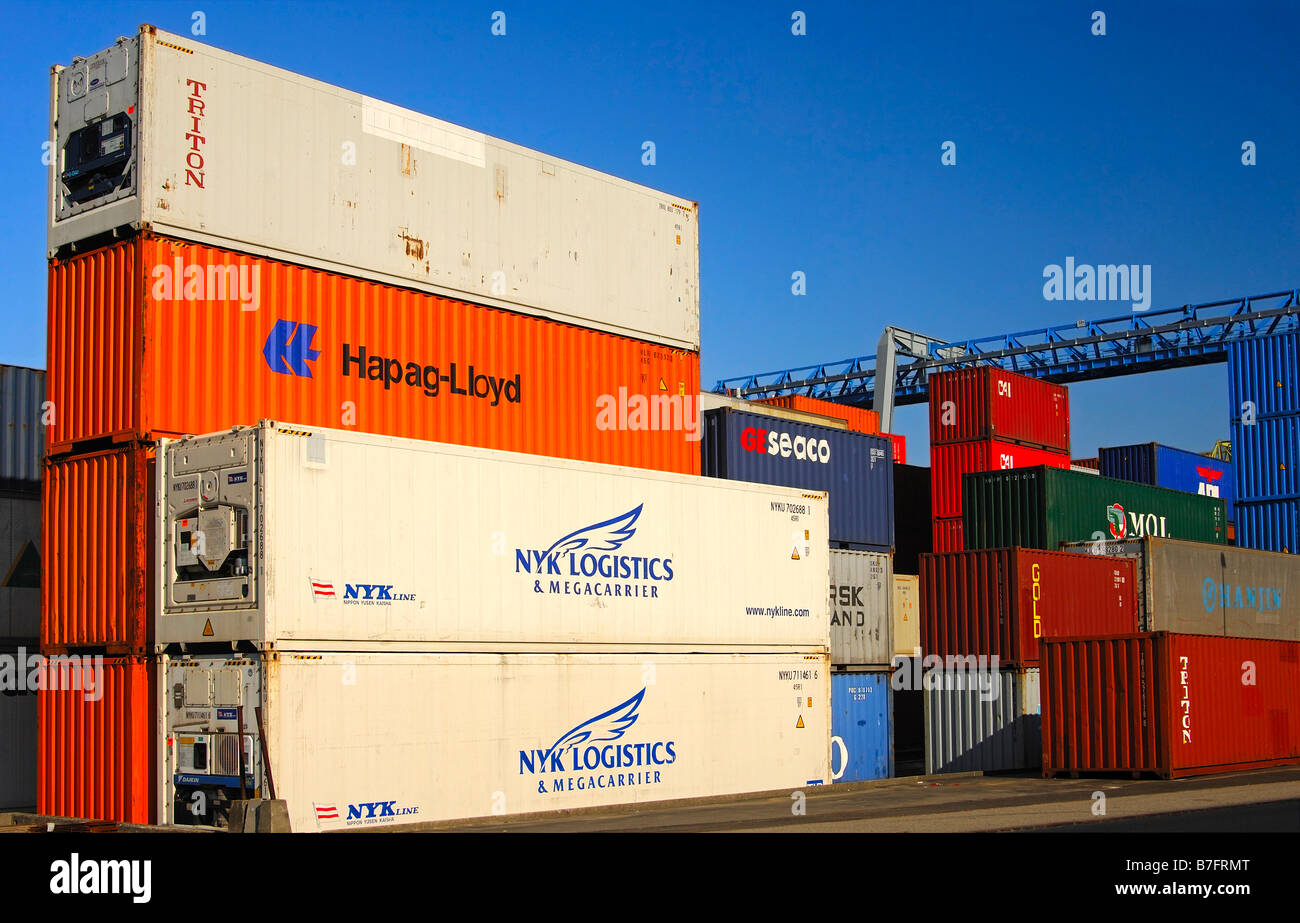 Stacked containers at the container depot of the company Swissterminal