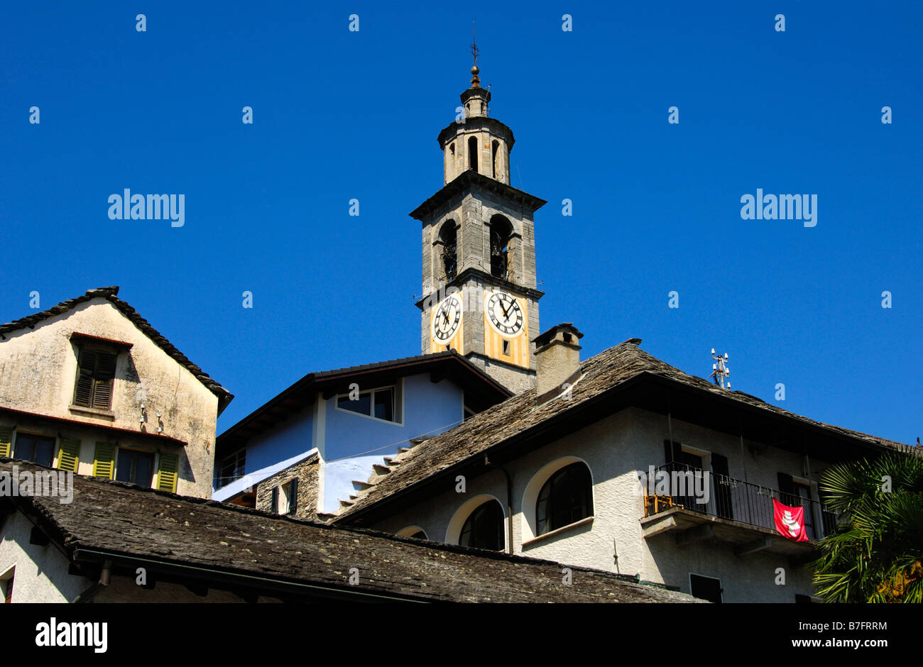 Campanile clock tower of the San Gottardo parish church Intragna Centovalli Ticino Switzerland Stock Photo