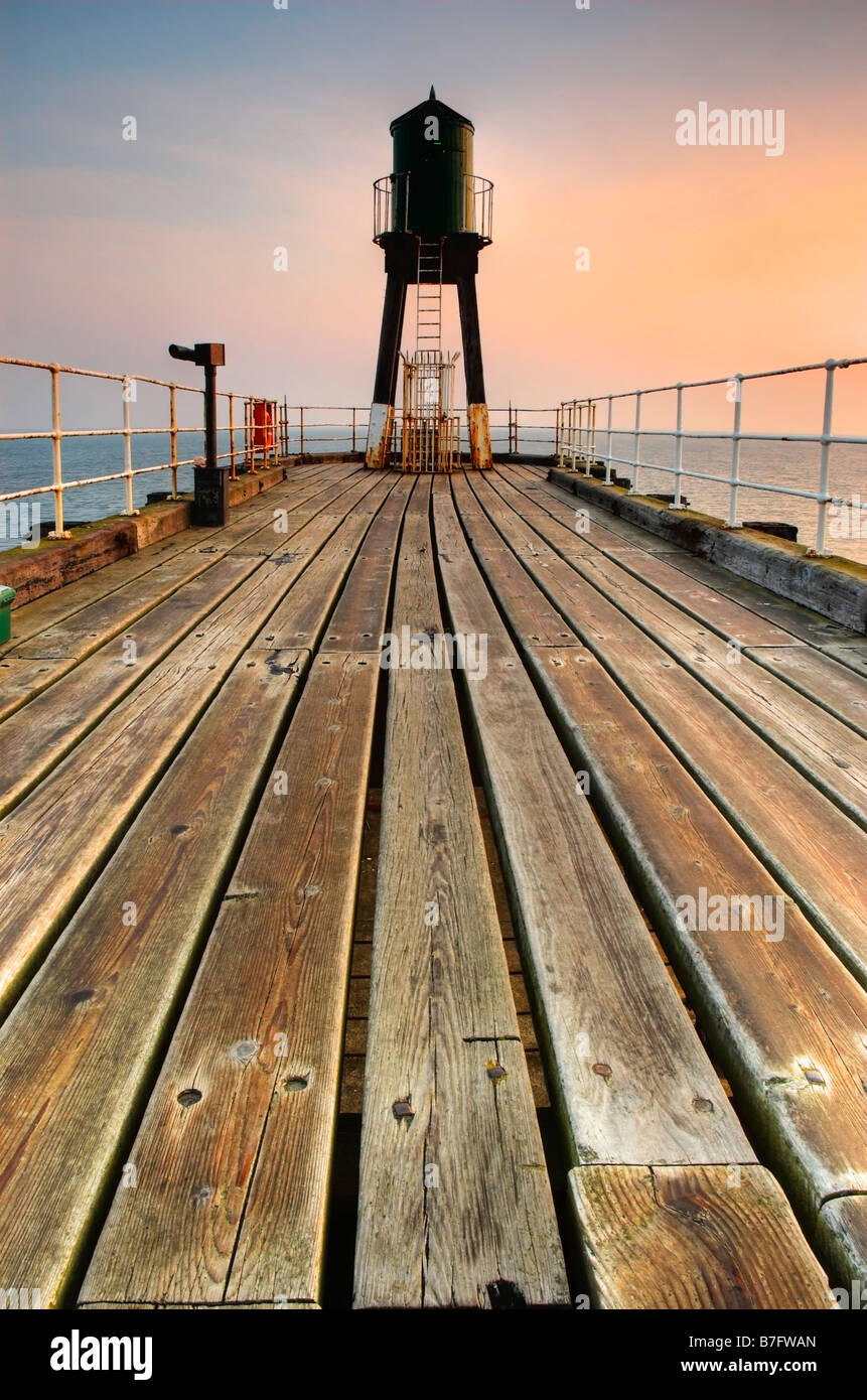 Dawn on the west pier at Whitby, North Yorkshire Stock Photo