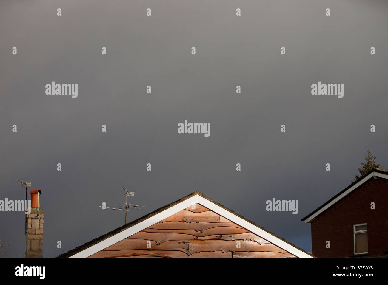 Dark sotrm cloud over a house in Clitheroe Lancashire UK Stock Photo